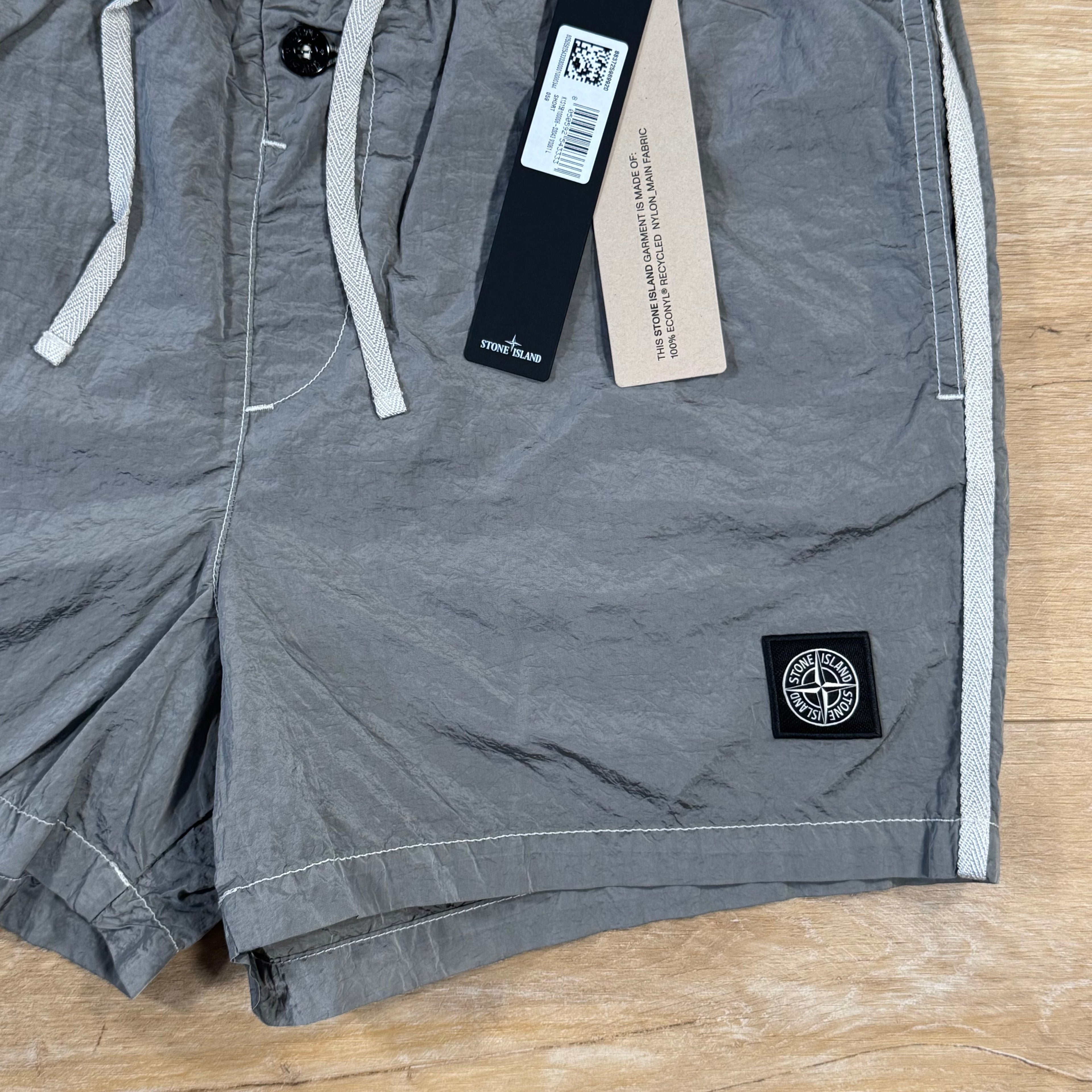 Stone Island Nylon Metal Button Swim Shorts in Pearl Grey